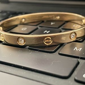 Cartier love bracelet, 18k gold with diamonds. Well cared for